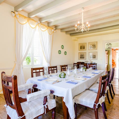 Tuck into hearty French cuisine around your majestic dining table