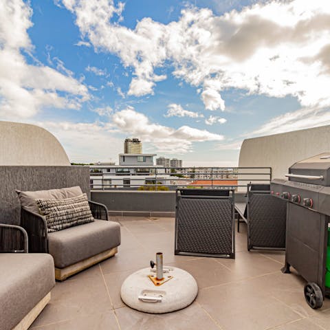 Enjoy some sundowners on the private rooftop terrace