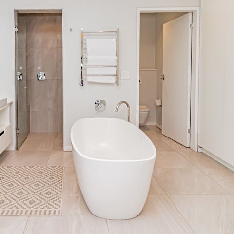 Have a long soak in the freestanding bath after a busy day in Cape Town