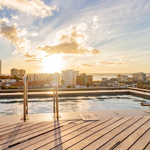 Go for a sunset dip and take in the views of Cape Town and teh sea from the communal rooftop pool
