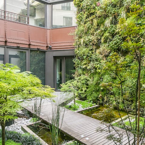 Head outdoors to the tranquil garden for a green space in the city