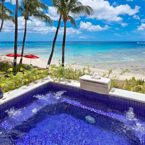 Relax in your private plunge pool overlooking the sea
