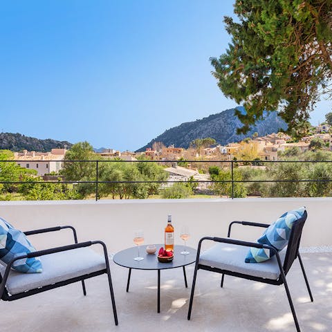 Sit out on the private balcony of one of the bedrooms and enjoy the surrounding mountain views