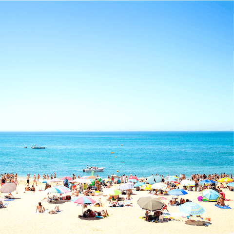 Soak up the sun and sea air at the beach in Carvoeiro