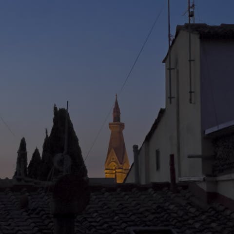 Enjoy garden views of the bell tower of the Basilica of Santa Croce