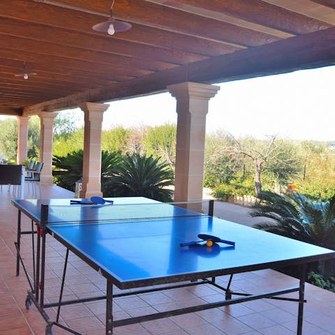 Challenge your friends to a game of table tennis on the terrace in the warm afternoon