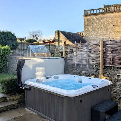 Take a relaxing soak in the hot tub on summer evenings