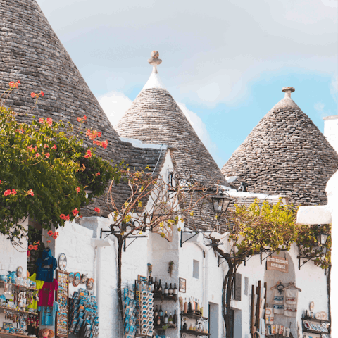 Visit the town of Alberobello for the day, a thirty-minute drive from home