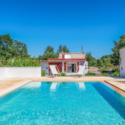 Swim a few lengths in the pool to keep up with your fitness regime