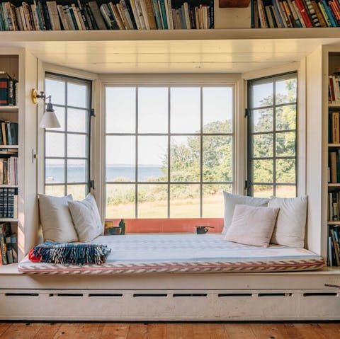 Make yourself comfortable in the bay window with its stunning sea views