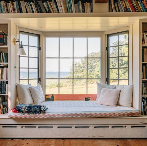 Make yourself comfortable in the bay window with its stunning sea views