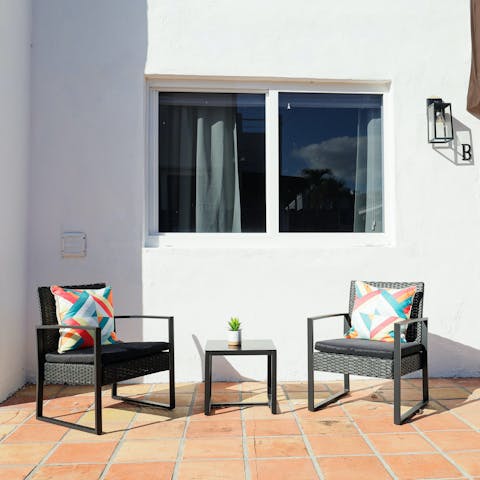 Soak up the Miami heat on the shared patio