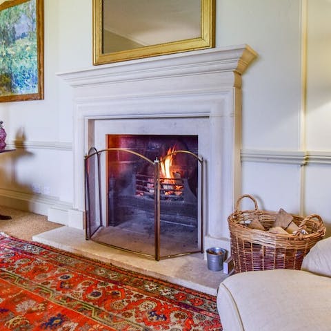 Cosy up by one of four real fireplaces