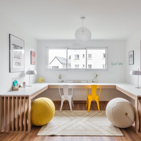 Co-work or brainstorm in style, sat at the communal desk space