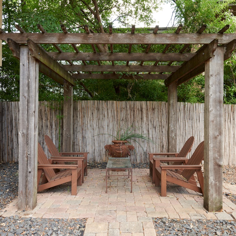 Take your morning coffee out to the leafy patio on a sunny day