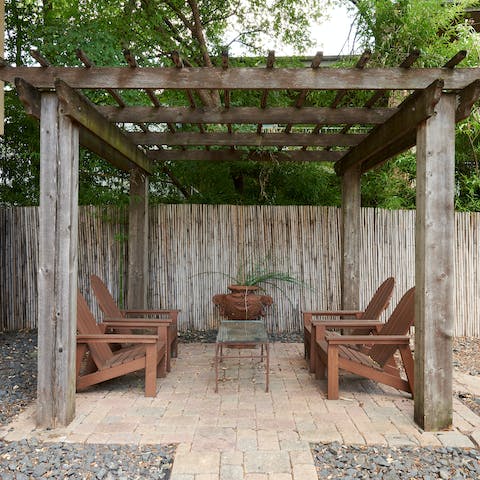 Take your morning coffee out to the leafy patio on a sunny day