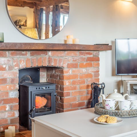 Spend a cosy evening warming up by the log burner