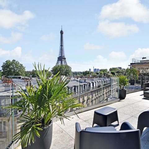 Admire the wonderful Eiffel Tower views from the private terrace