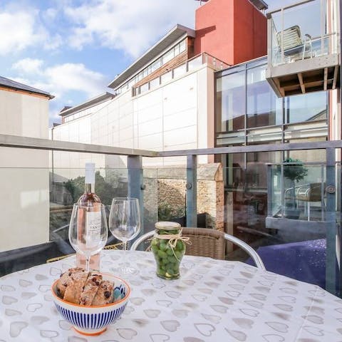 Dine alfresco on your private balcony