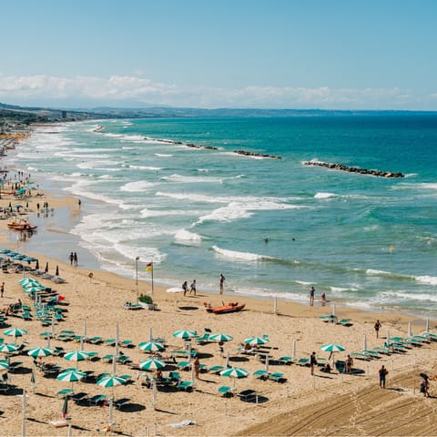 Spend the day at Torre Beach Pozzelle, only a short drive away