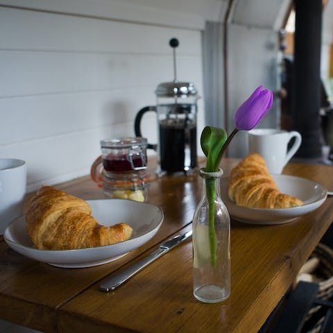 Grab a couple of fresh pastries and tuck in at the dining table for two