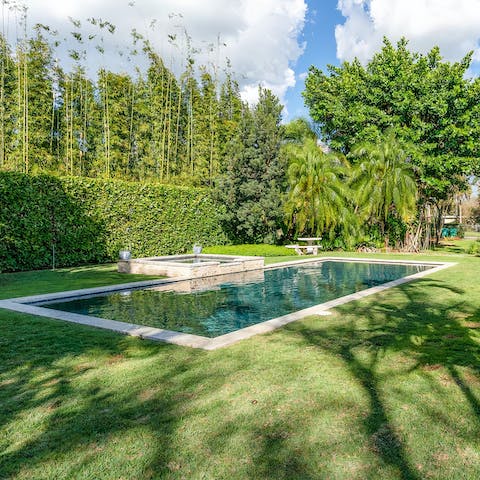 Float in the private pool, admiring the greenery all around whilst your at it