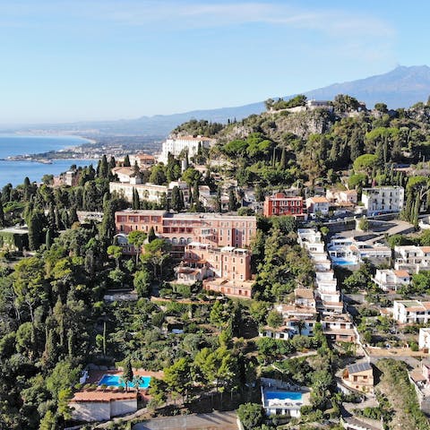 Experience the beauty of Sicily from the hilltop town of Taormina