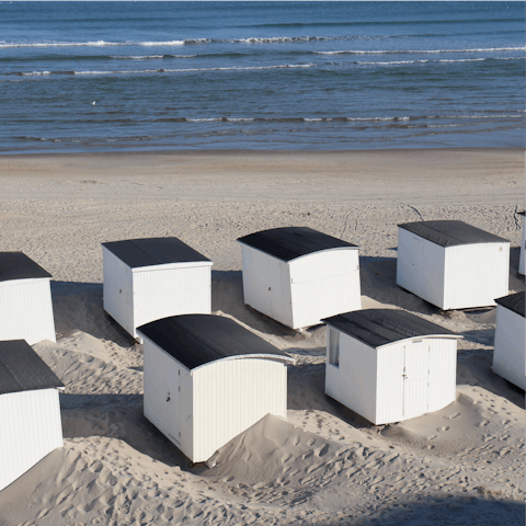 Take a fifteen-minute stroll to Løkken Strand and admire the famous white beach houses