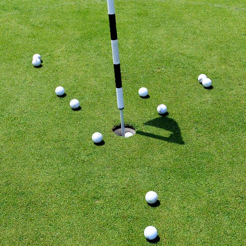 Enjoy a game at Løkken Golf Club, a four-minute drive away