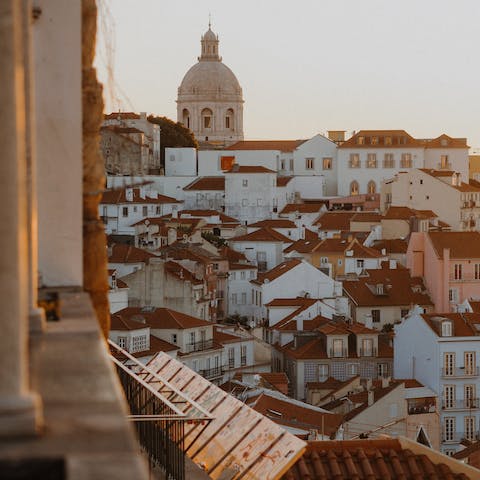 Gaze out over Lisbon's distinctive terracotta rooftops from Miradouro de Santa Luzia – a couple of minutes away