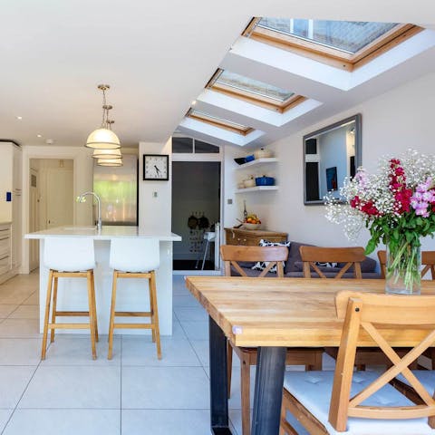 Feast together in the open-plan kitchen and dining space