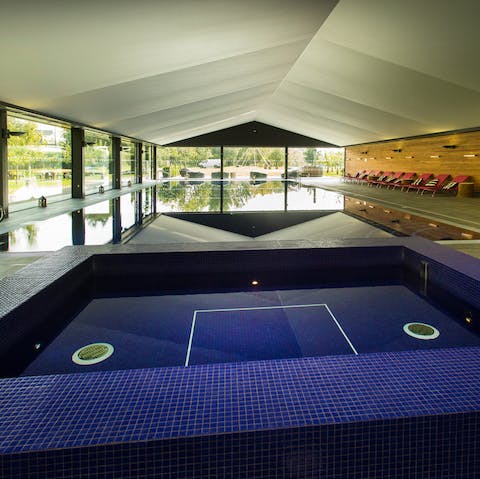 Unwind and relax in the communal spa and swimming pool