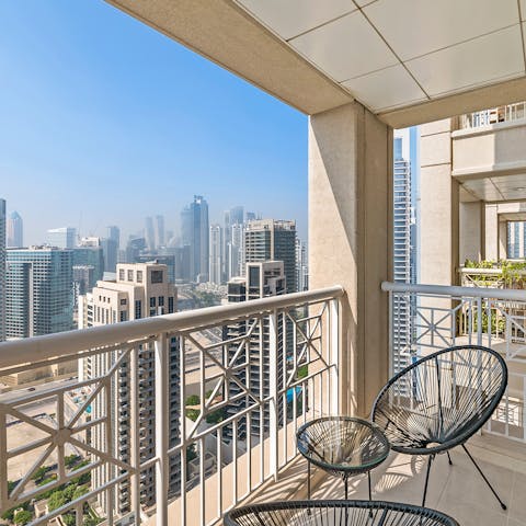 Take your morning cup of coffee out to your private balcony to take in views of the cityscape