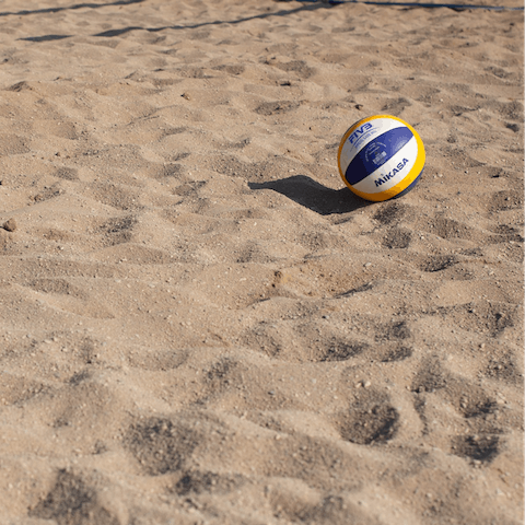 Play a game of beach volley ball at Bonita Cove – a one-minute walk from your door