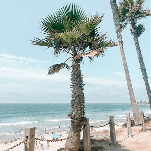 Spend sunny days on Mission Beach – a short seven-minute walk away