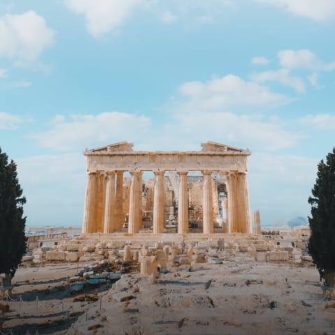 Experience the ancient wonders of the Acropolis, just a two-minute walk away
