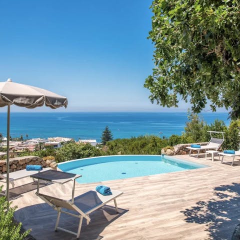 Soak up views of the Tyrrhenian Sea as you bob about in the private pool