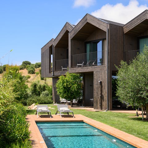 Grab a drink and your favourite book and relax poolside