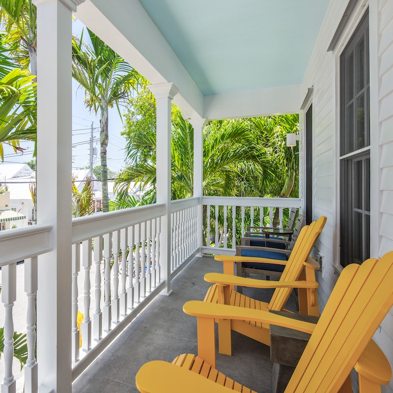 Watch the hustle and bustle of Duval Street from your balcony