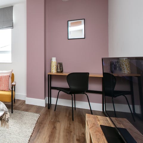 Get some work done at the dedicated laptop desk in the living room