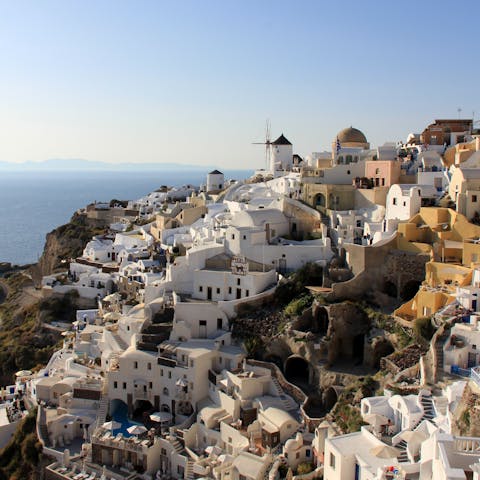 Breathe in the views of beautiful Fira after a 13km drive