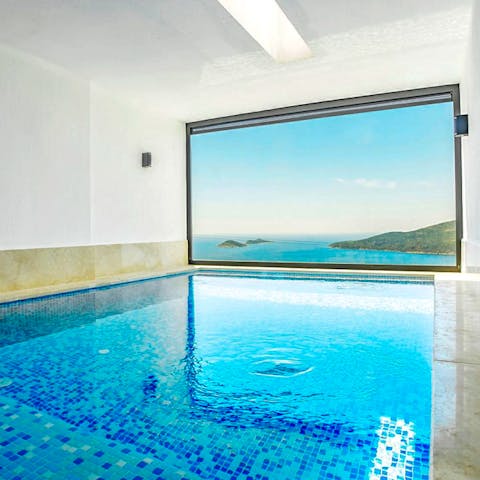 Take a dip in the indoor pool, overlooking the views of the sea on the horizon