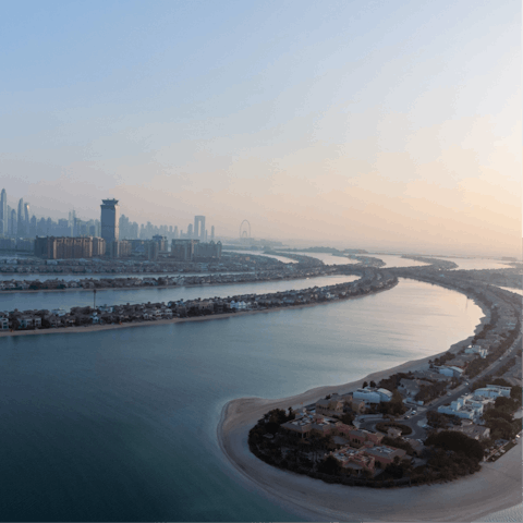 Make your way to the iconic Palm Jumeirah – just a short drive away
