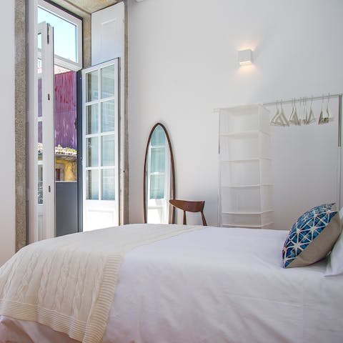 Wake up in the stylish main bedroom and step straight onto the balcony for a hit of sunshine first thing