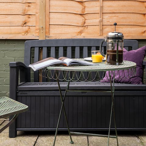 Relax outside on the private patio during the warmer months 