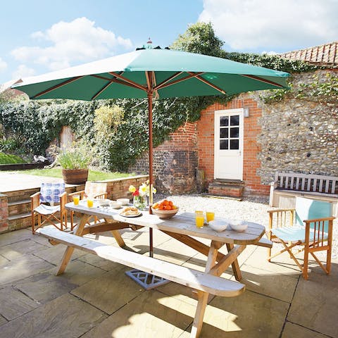 Gather around for a hearty breakfast on the picnic bench in the garden