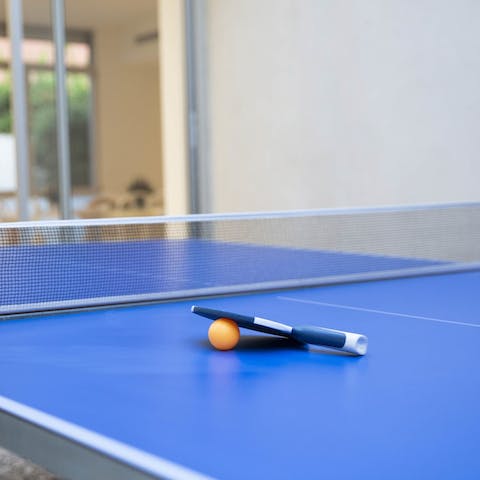 Enjoy a competitive family ping pong tournament