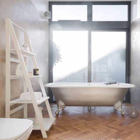 Enjoy a soak in the free-standing bath after a long day out