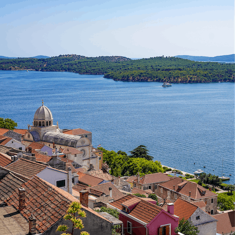 Drive eleven minutes to Šibenik for cocktails and dinner with a view