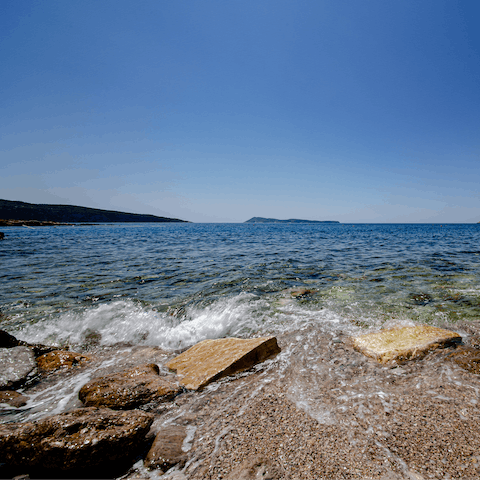 Swim in the crystal clear sea at Brodarica beach – it's a fourteen-minute walk